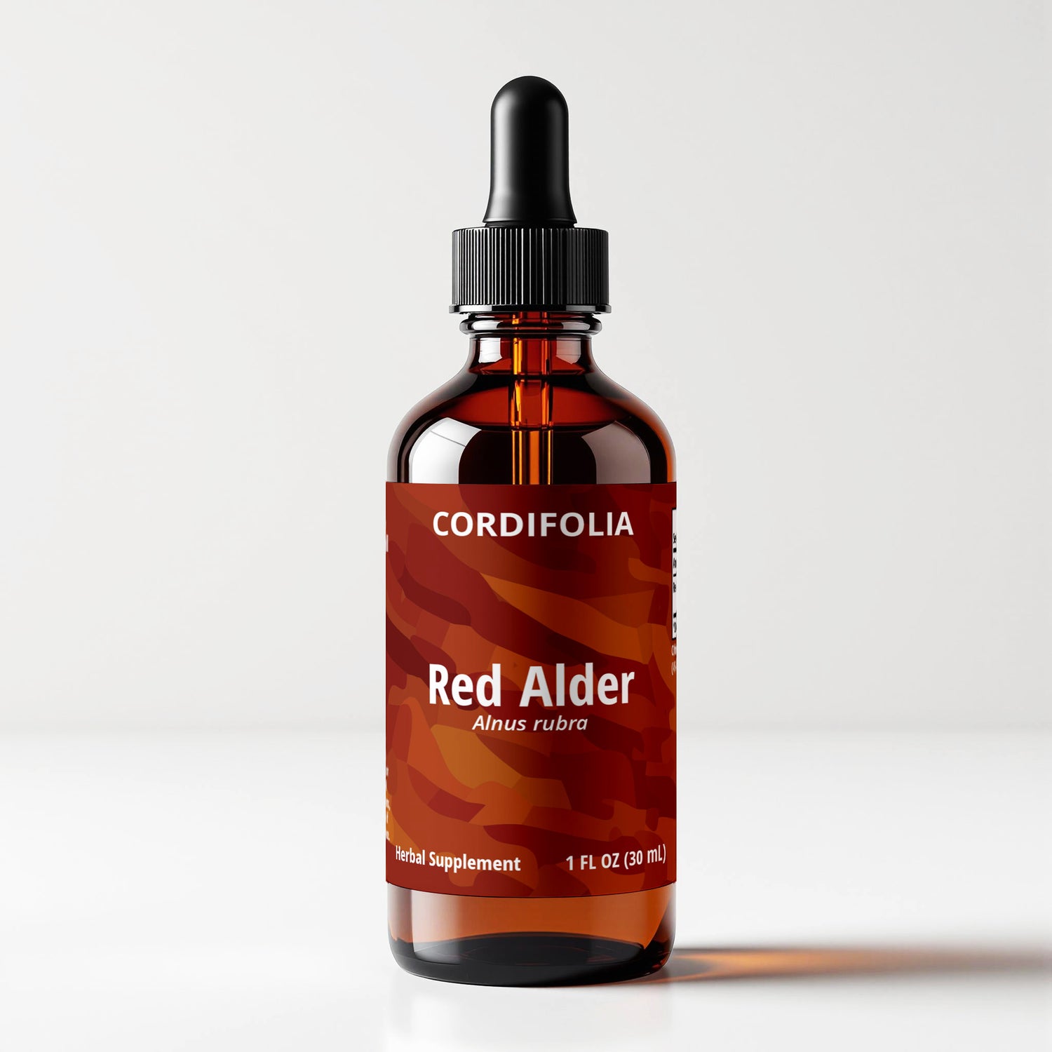 Red Alder (Alnus rubra) herbal tincture bottle, front label panel view, red abstract macrophotography art, CORDIFOLIA brand.